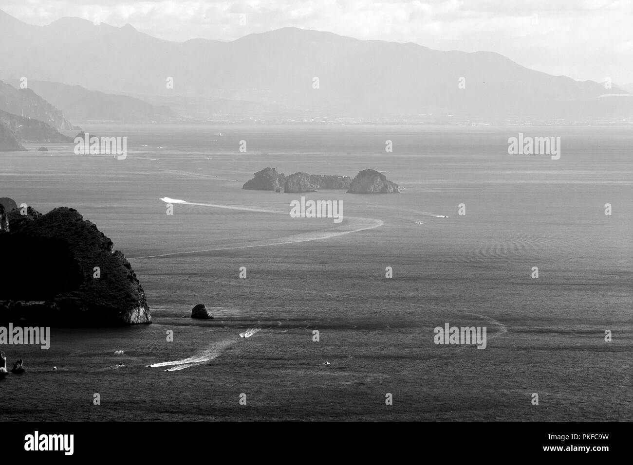 Beautiful aerial view of Napoli gulf from Capri island, with boat trails on the water Stock Photo