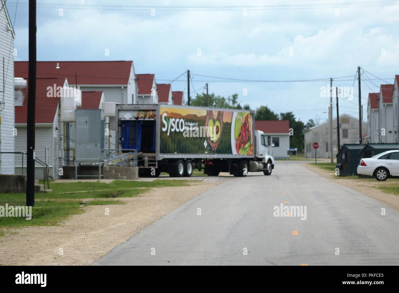 A truck with food supplier Sysco Foods of Baraboo, Wis., is unloaded at