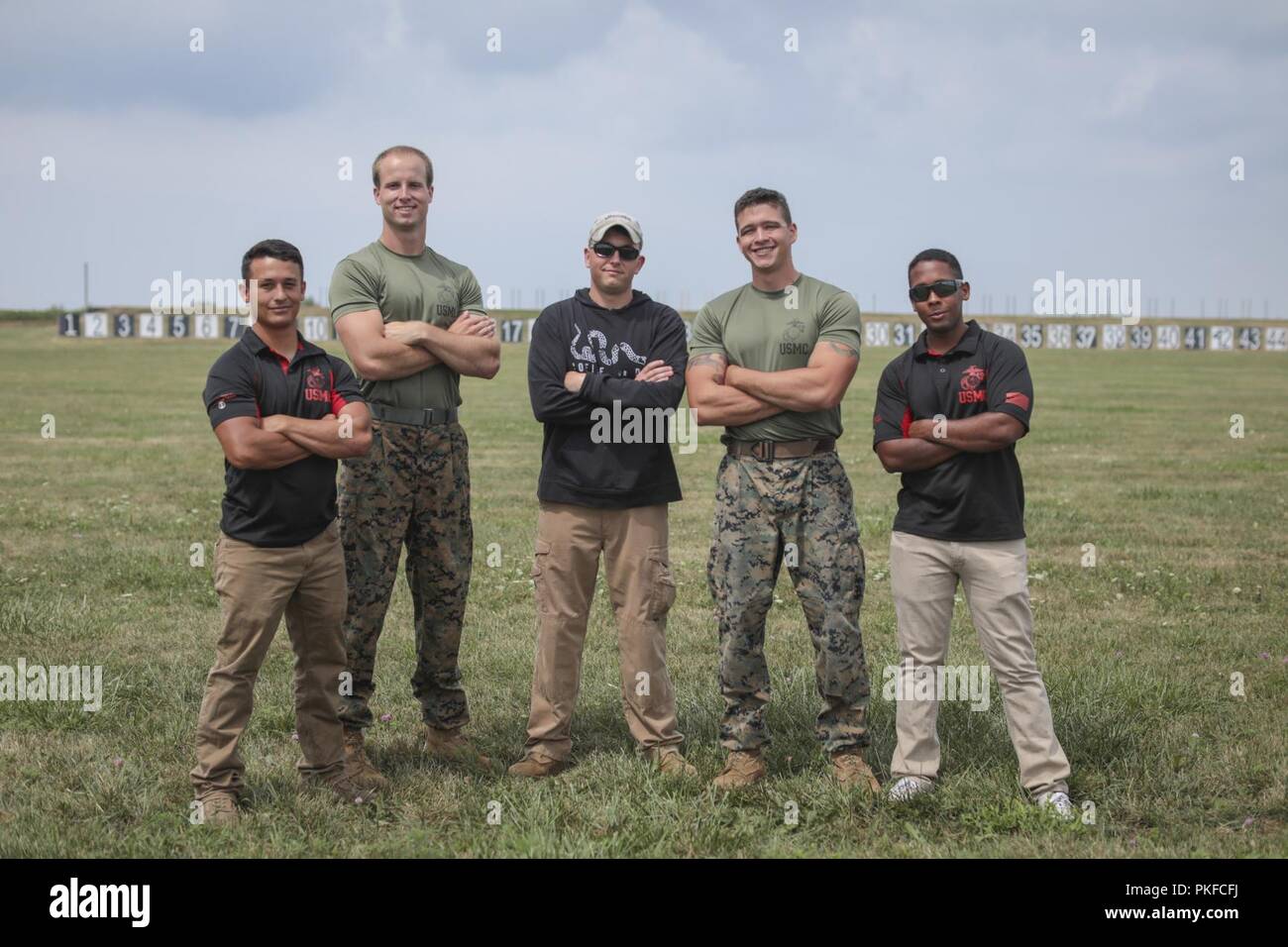 Marines from the MCRD Parris Island Shooting Team pose for a photo at Camp Perry, Ohio Aug. 1, 2018. The members are, from left to right, Sgt. Thomas Colyard, Cpl. Trevor Keith, GySgt. Josh Heckman, Sgt. Cody Cheney and Cpl. Victor Irizarry. The Marines were at Camp Perry for the Civilian Marksmanship Program National Matches July 23 through Aug. 5. The National Trophy Rifle Matches are an annual sporting festival established by congress and President Roosevelt in 1903. The event welcomes over 6,000 participants, ranging from beginning shooters to the world’s top-performing competitors. Shoote Stock Photo
