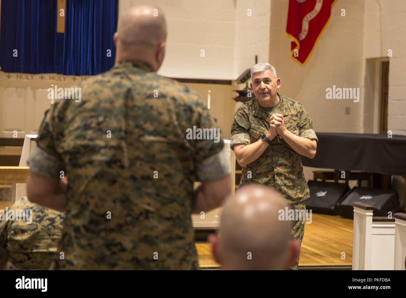 Rear Adm. Gregory Todd, the current Chaplain of the Marine Corps, Deputy Chief of Chaplains, Deputy Director of religious Ministries takes questions during a visit to Marine Corps Base Camp Lejeune, Aug. 9, 2018.  Todd assumed his current duties as the 20th Chaplain of the Marine Corps in June 2018. Stock Photo