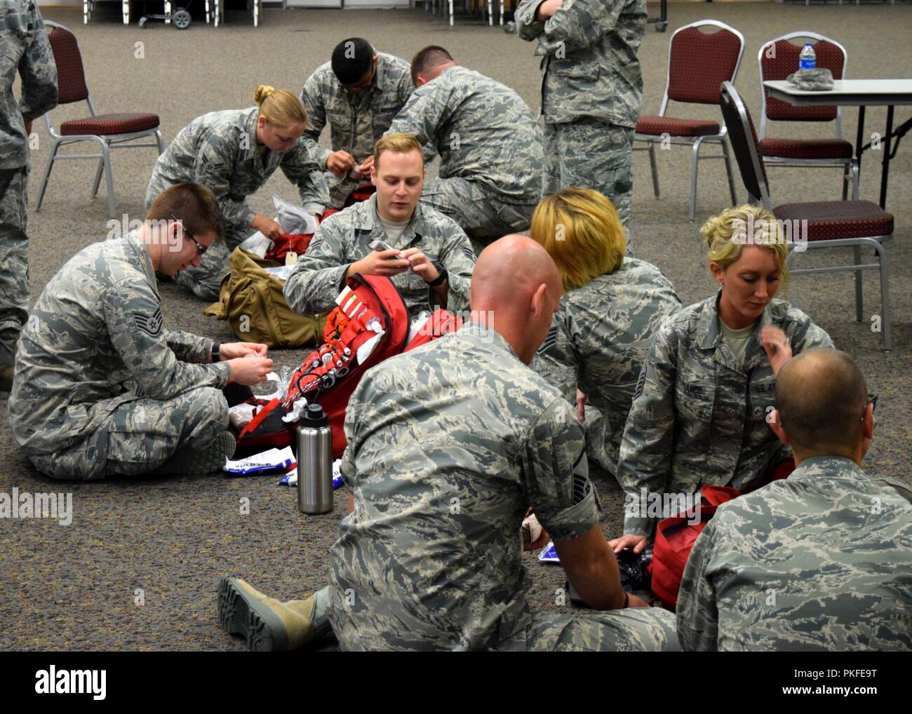 Members of the Medical Group, 185th Air Refueling Wing, Sioux City, Ia., participate in the Savannah Storm Exercise at the Savannah Air National Guard Base in Georgia. The Medical Group's Medical Rapid Response Team (MRRT) prepares their go-bags for the upcoming mass-casualty exercise. Stock Photo