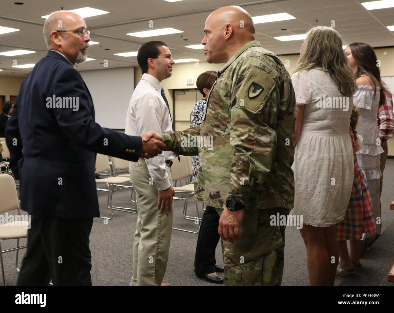 U.S. Army Chemical Materials Activity (CMA) Commander Col. Kelso Horne gets to know members of the CMA workforce following a change of command ceremony August 2, 2018 at Aberdeen Proving Ground in Edgewood, Md. Horne is CMA's third military director. Stock Photo