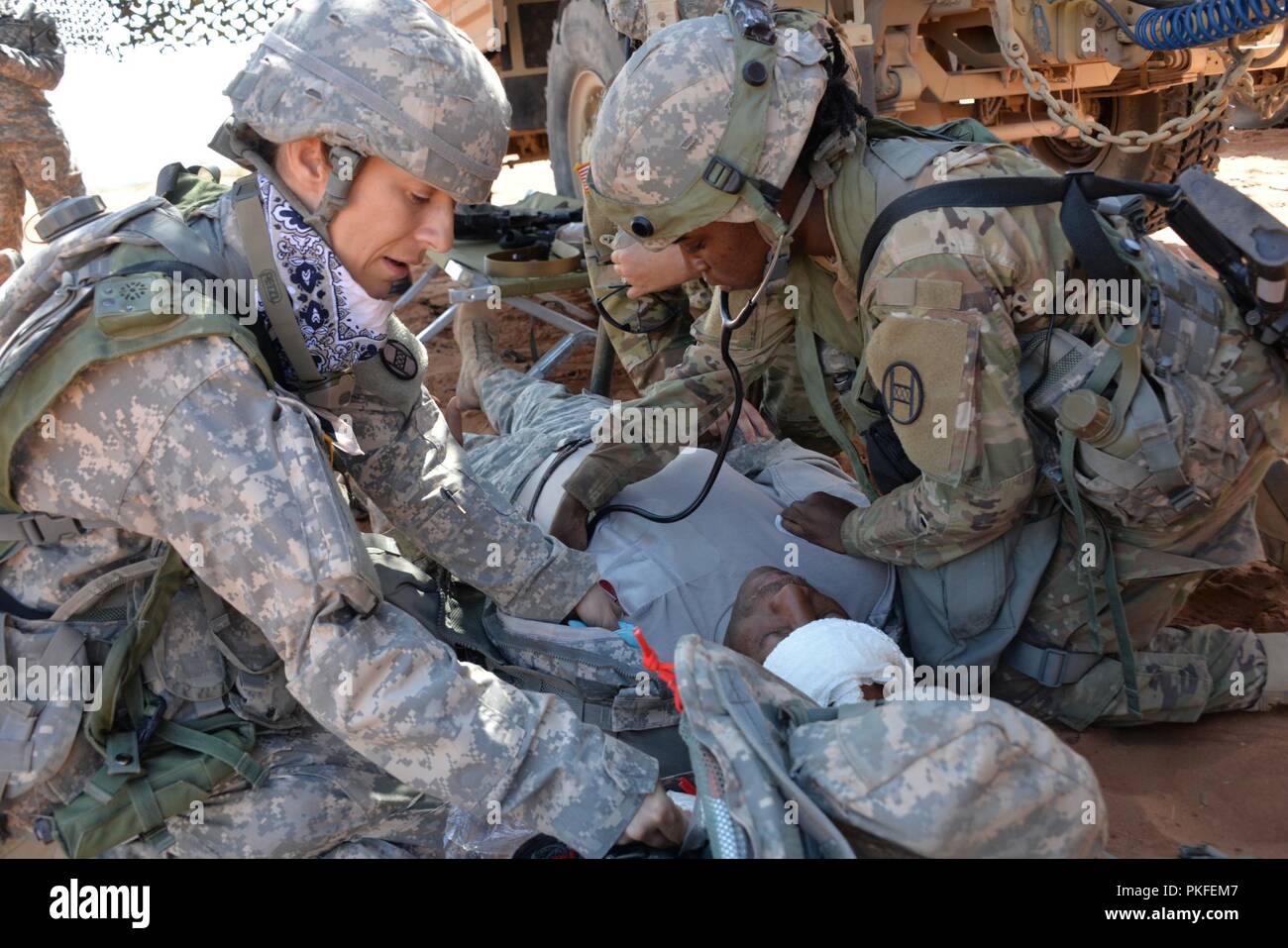 Medical intervention on the battlefield hi-res stock photography and ...