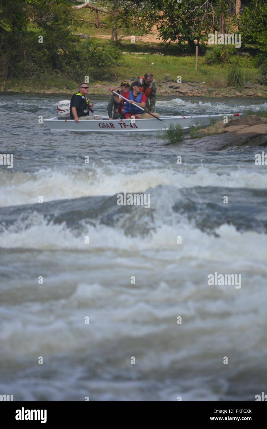 COLUMBUS, Ga. (Aug. 23, 2018) – Military and civilian personnel from Latin America as part of a Western Hemisphere Institute for Security Cooperation course worked closely with local emergency services from Fort Benning and Columbus, Georgia, and Phenix City, Alabama, to rescue survivors of a notional flood, who were stranded on the islands of the Chattahoochee River in Columbus Aug. 10. Stock Photo