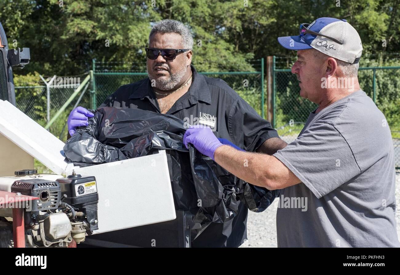 Darryl Moore (left), U.S. Department of Agriculture Animal and Plant