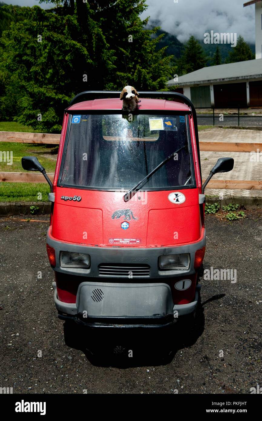 a three wheeled Vespa Piaggio APE 50 vehicle in Pragelato in the Piedmont region (Italy, 16/06/2010) Stock Photo