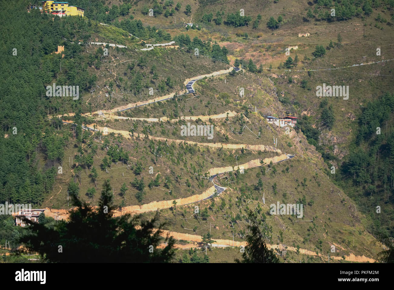 Spiral ,metalled road,for higher climb,on hiill,South Thimpu,Bhutan. Stock Photo