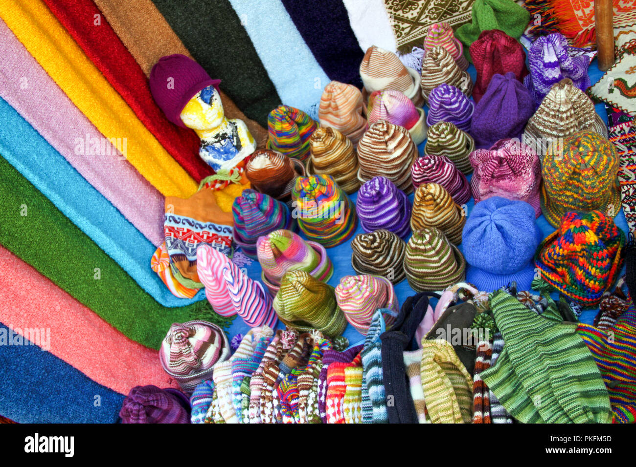 Multicoloured Wool Hats and Scarfs on Mexican Market Stall Stock Photo
