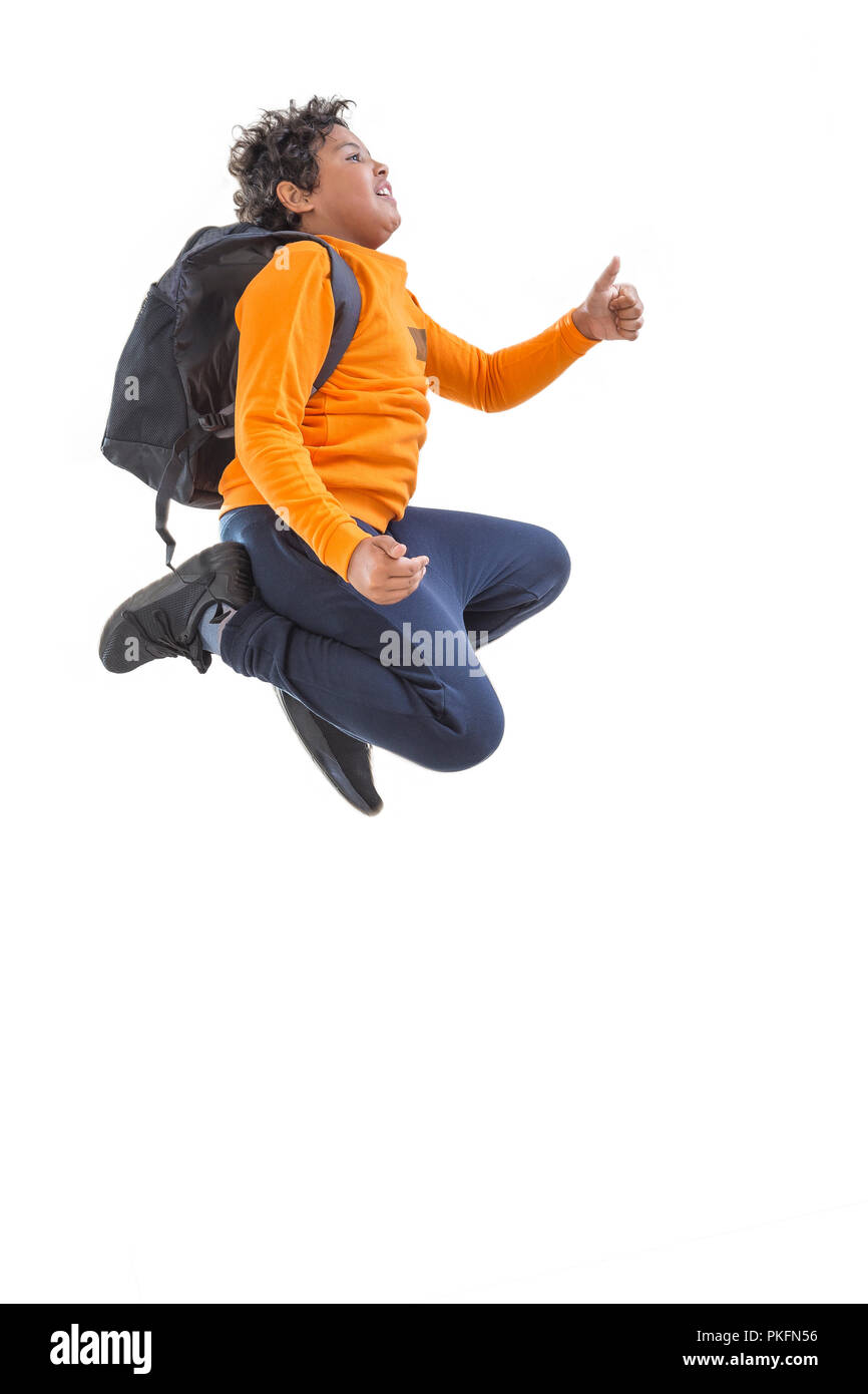 happiness back to school. Happy teen boy with backpack on the first school day. Excited to be back to school after vacation. Stock Photo