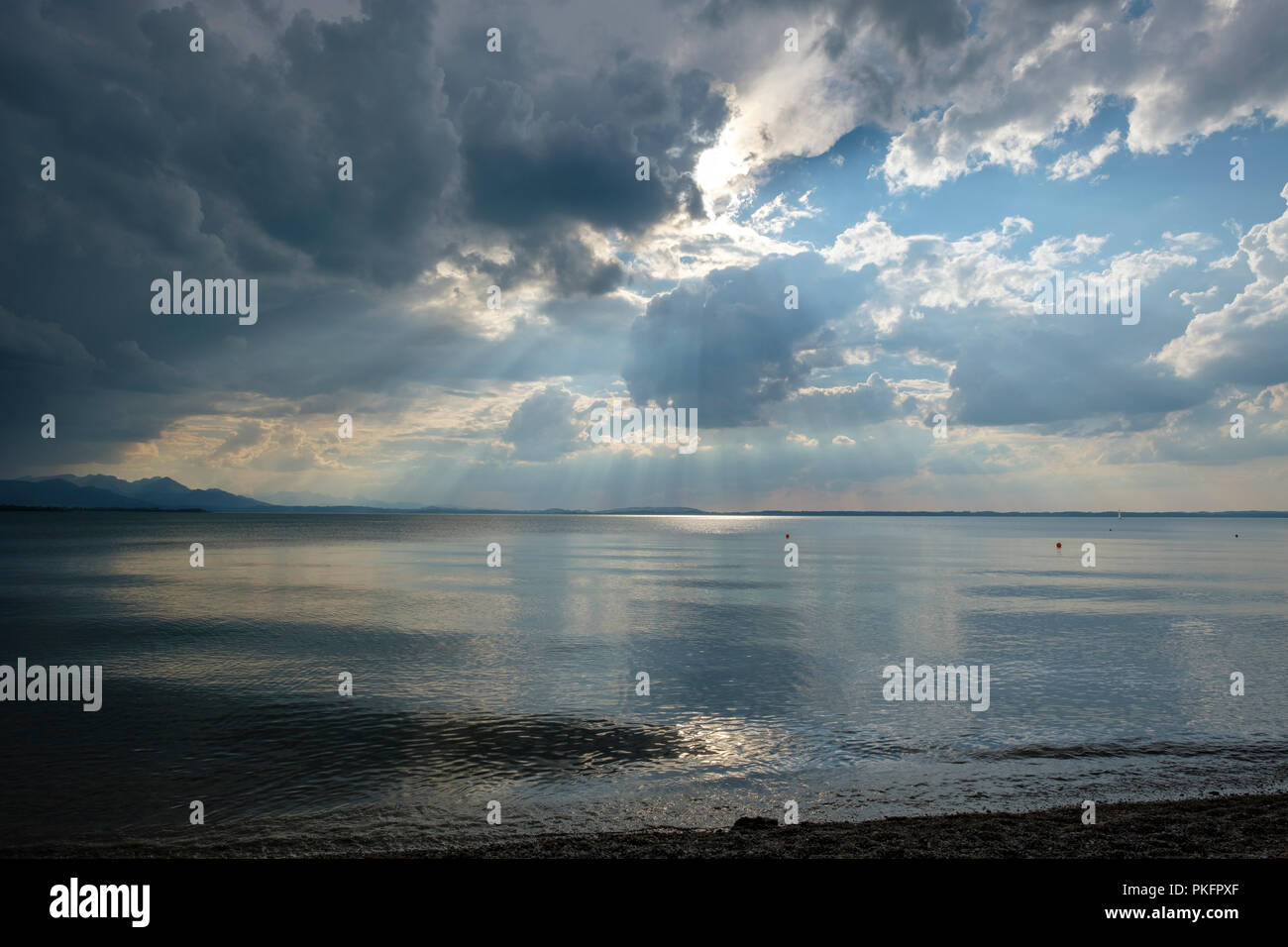 Storm clouds, dark clouds over the lake, Chieming am Chiemsee, with Chiemgau Alps, Bavaria, Germany Stock Photo