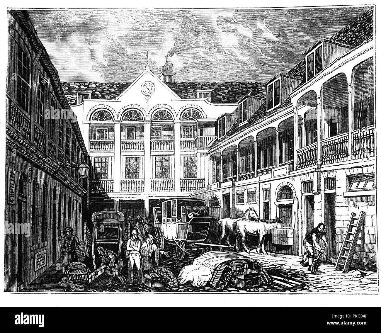 The galleried courtyard of the Blue Boar Tavern in Holborn, London cluttered with carriages, horses and luggage. Demolished in 1864 it was infamous as a stop off en route to the hangings at Tyburn. It was here that history was made when one of Cromwell's spies at the palace informed him that he  and Henry Ireton'd death was decreed and a letter to that effect was on it's way from the King to the Queen.  When it was discovered Cromwell and Ireton disguised themselves as soldiers and at swordpoint, searched the messenger, opened the letter and found that the King was about to end the rebellion. Stock Photo