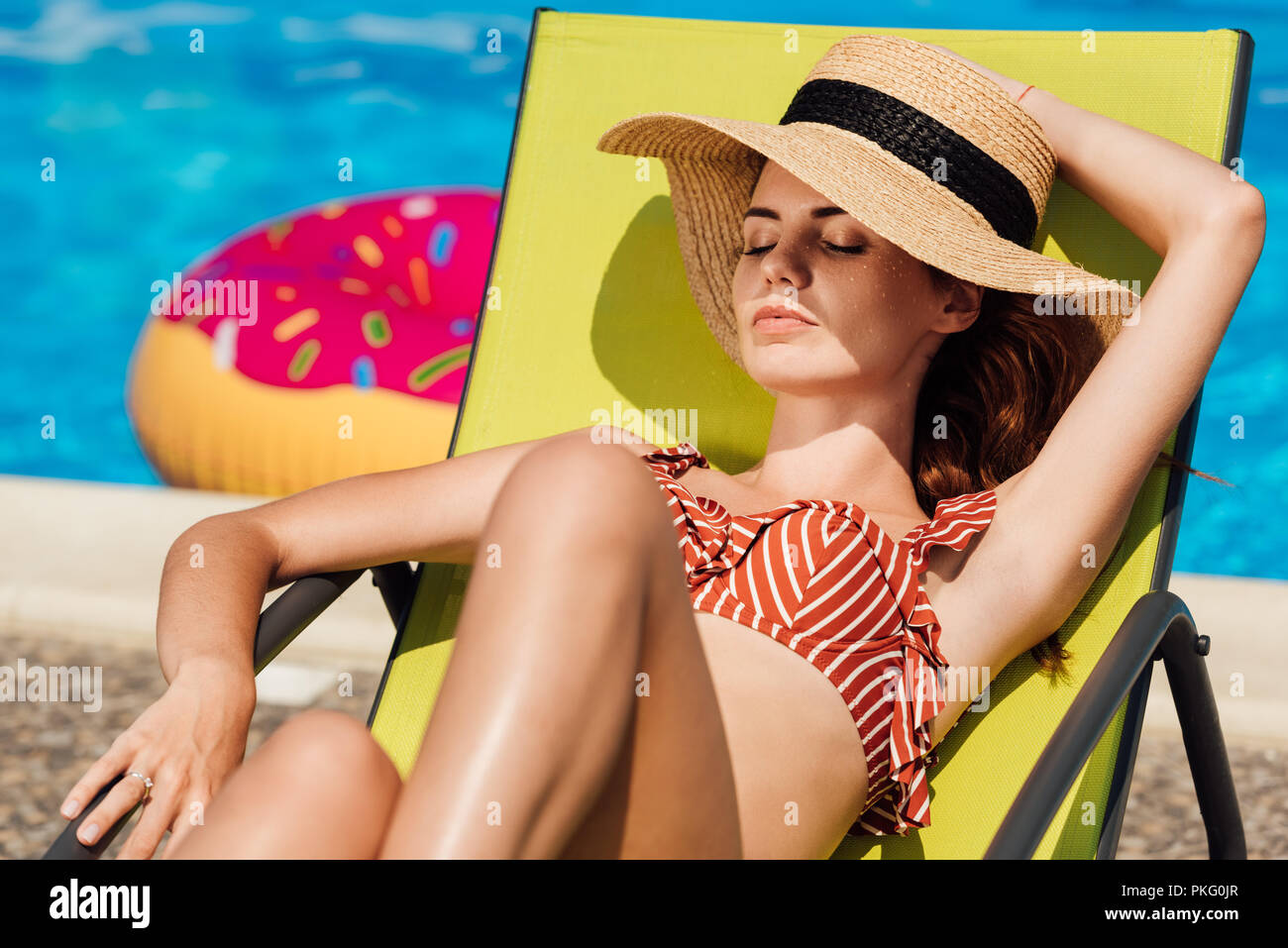 Hat bikini sun lounger hi-res stock photography and images - Alamy