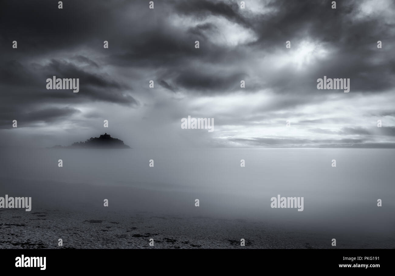 Mist rolling in over St Michael's Mount, Cornwall Stock Photo