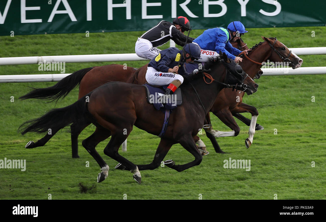 Another Eclipse ridden by Andrea Atzeni (front) wins the Mechanical Facilities Handicap during day two of the 2018 William Hill St Leger Festival at Doncaster Racecourse, Doncaster. Stock Photo