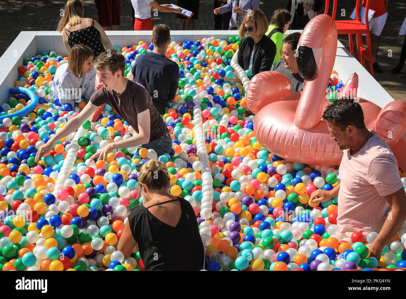 Southbank, London, UK, 13th Sep 2018. People have fun with 'Say Balls To  Boring'in the London sunshine. Claimed to be the UK's biggest outdoor ball  pit, it opens on the Southbank in