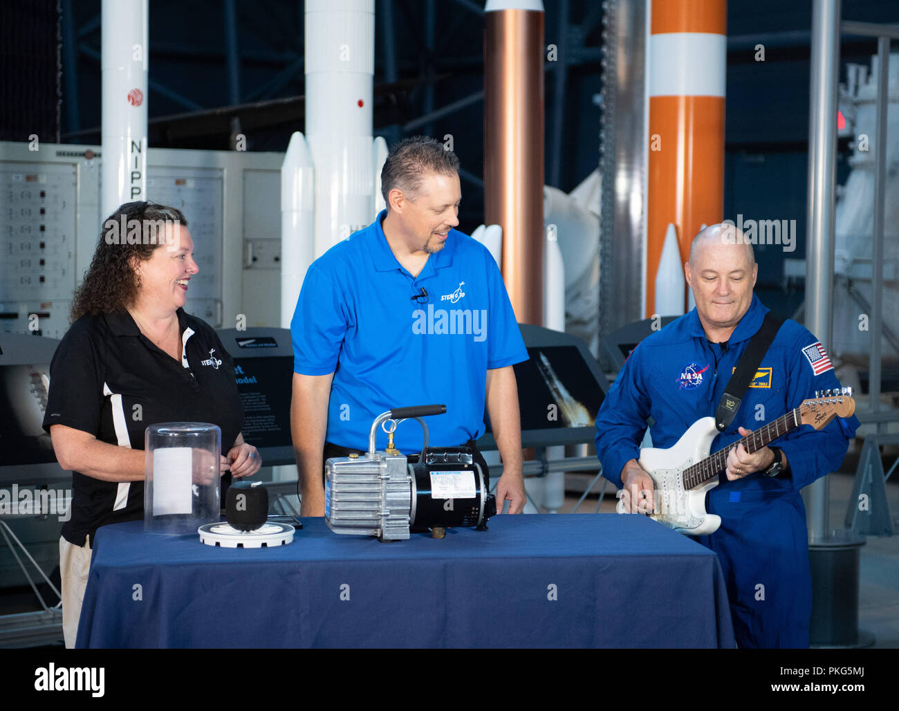 Chantilly, VA, USA. 12th Sep, 2018. NASA astronaut Scott Tingle plays an electric guitar during a taping of STEM in 30 with Beth Wilson and Marty Kelsey, Wednesday, Sept. 12, 2018 at the Smithsonian National Air and Space Museum's Steven F. Udvar-Hazy Center in Chantilly, Va. Tingle spent 168 days onboard the International Space Station as part of Expeditions 54 and 55. Photo Credit: (NASA/Joel Kowsky) NASA via globallookpress.com Credit: Nasa/Russian Look/ZUMA Wire/Alamy Live News Stock Photo