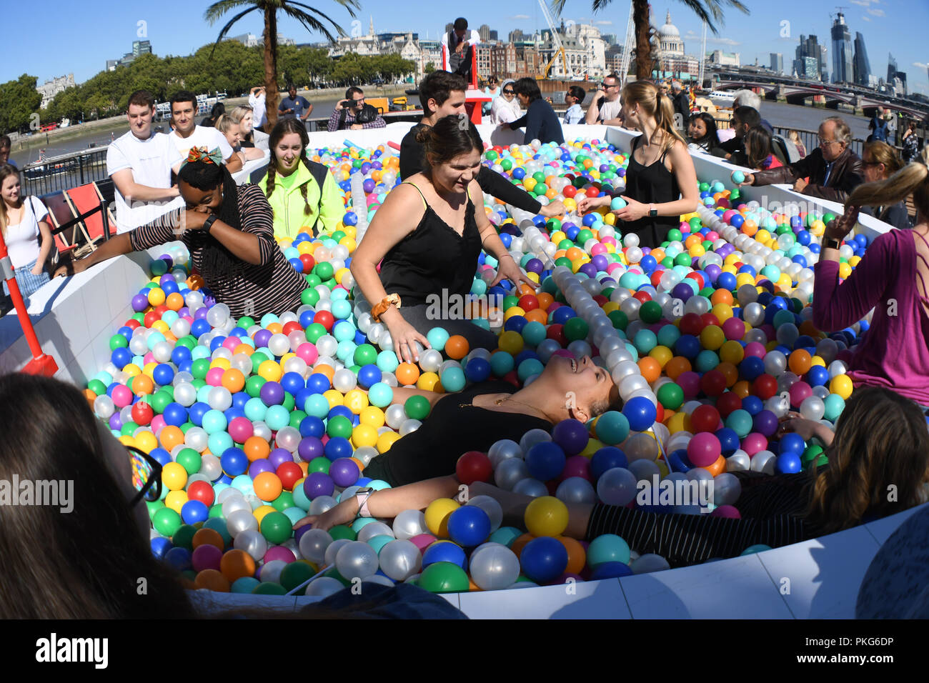 London, UK. 13th September 2018. ‘Say Balls to Boring’ ball pool in association with Virgin Holidays will be at Observation Point on the Southbank between 11am to 7pm on Thur Sep 13 and 9am to 6pm on Fri Sep 14. Credit: Picture Capital/Alamy Live News Stock Photo