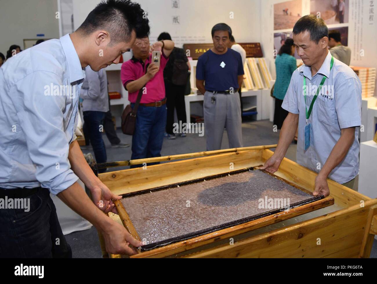 Chinese Developed Rice Paper Jinan, China's Shandong Province. 13th Sep, 2018. People view a making ...