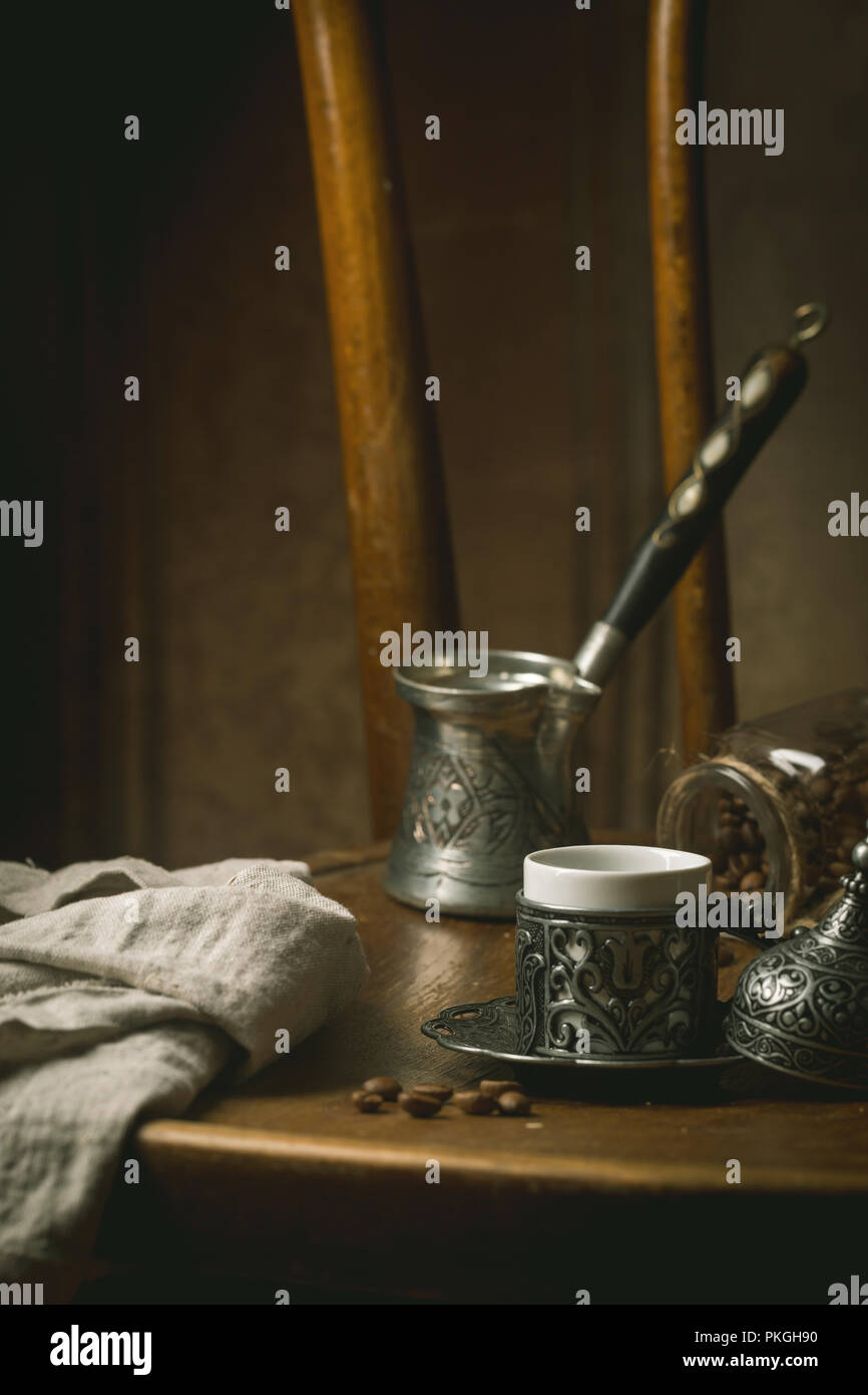Turkish coffee and traditional copper serving set over vintage