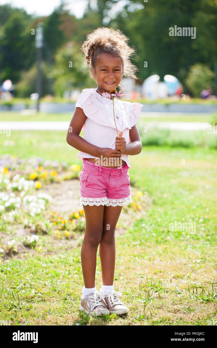Close up portrait of pretty mixed race AfricanAmerican little girl