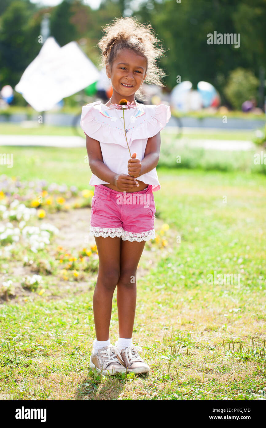 Close up portrait of pretty mixed race AfricanAmerican little girl