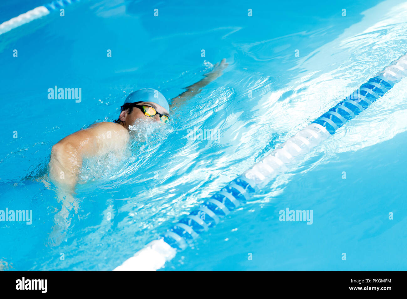 Freestyle swimmer in swimming pool Stock Photo - Alamy
