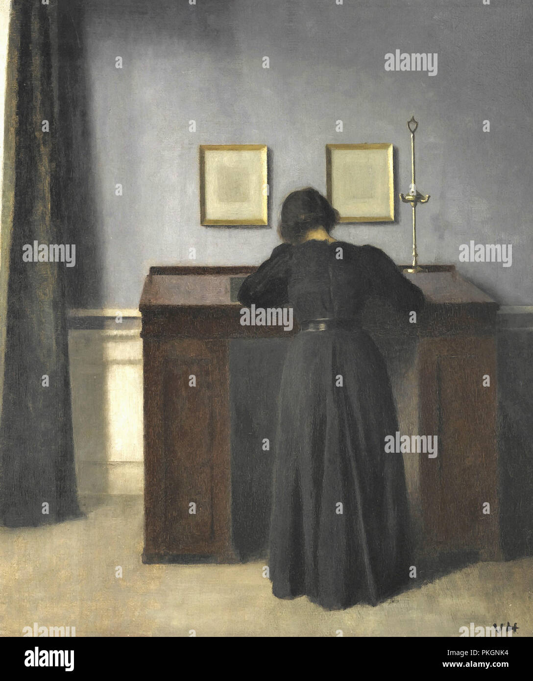 Hammershoi Vilhelm - Ida Standing at a Desk Stock Photo - Alamy