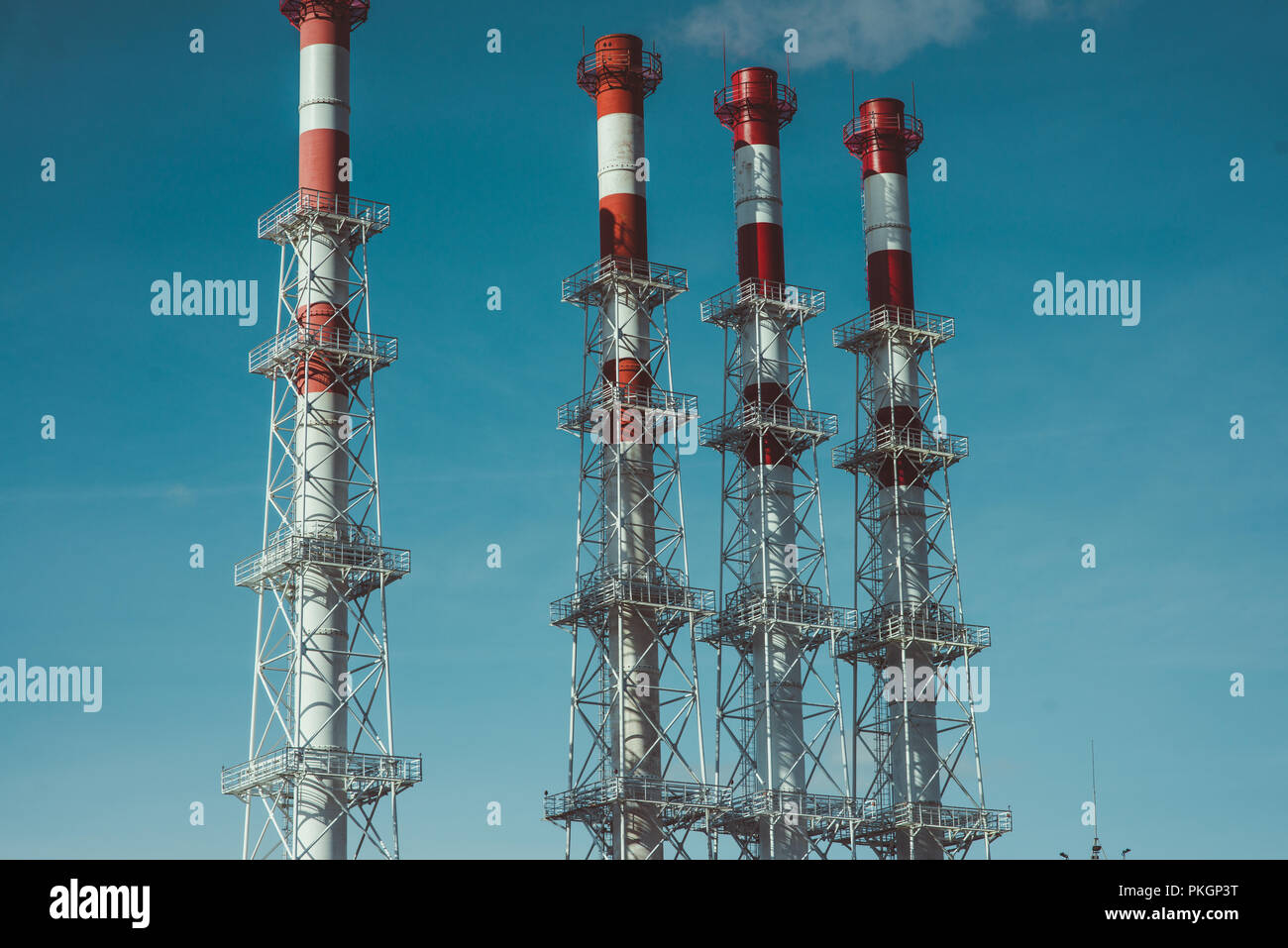 Industrial zone,The equipment of oil refining,Close-up of industrial pipelines of an oil-refinery plant Stock Photo