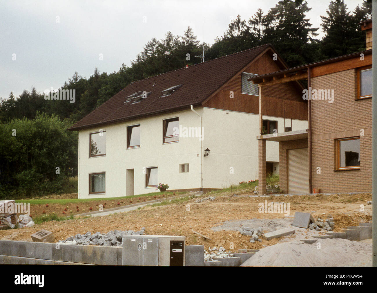 Archival image from the 1970s of a modern house being constructed in Oberjosbach, Niedernhausen Germany. Stock Photo