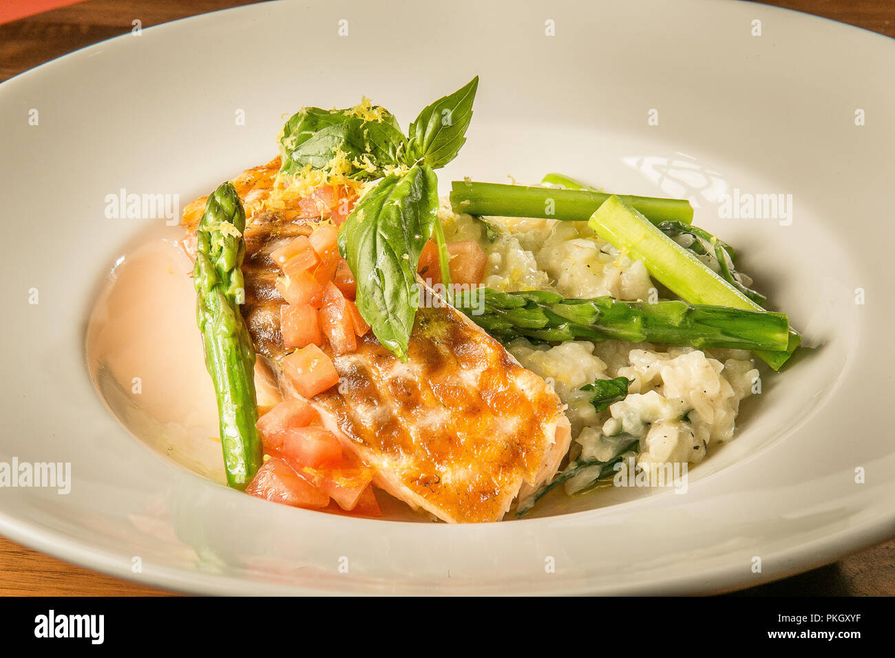 New Modern Italian Menu Photo Shoot . Grilled Salmon Risotto .Arpi Pap Studio  Images Stock Photo