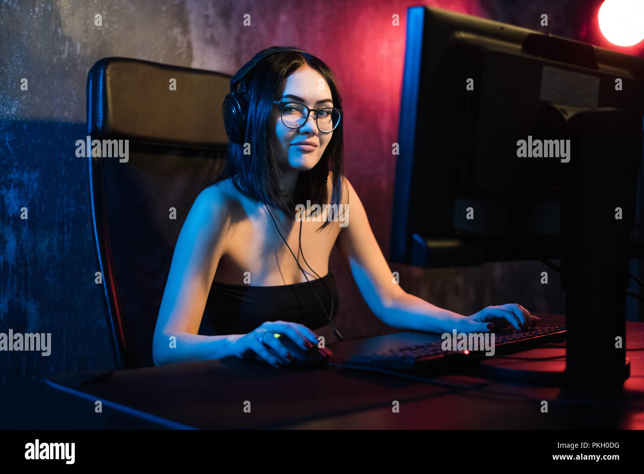 Happy Pretty Blonde Gamer Girl Playing Online Video Game on Her Personal  Computer Stock Photo - Alamy