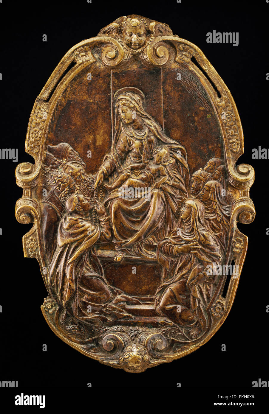 The Madonna of the Rosary. Dated: mid 16th century. Dimensions: overall (oval): 14.8 x 9.9 cm (5 13/16 x 3 7/8 in.) gross weight: 216 gr. Medium: bronze. Museum: National Gallery of Art, Washington DC. Author: Style of Jacopo Sansovino. Stock Photo