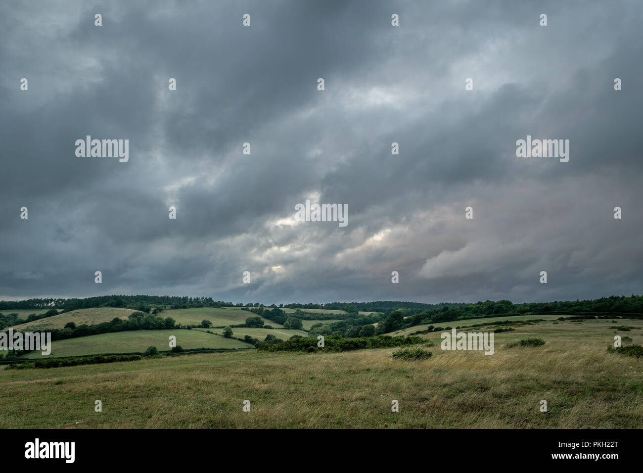 Dark and moody skies above Peak Hill near Sidmouth, East Devon, South West England, United Kingdom. Stock Photo