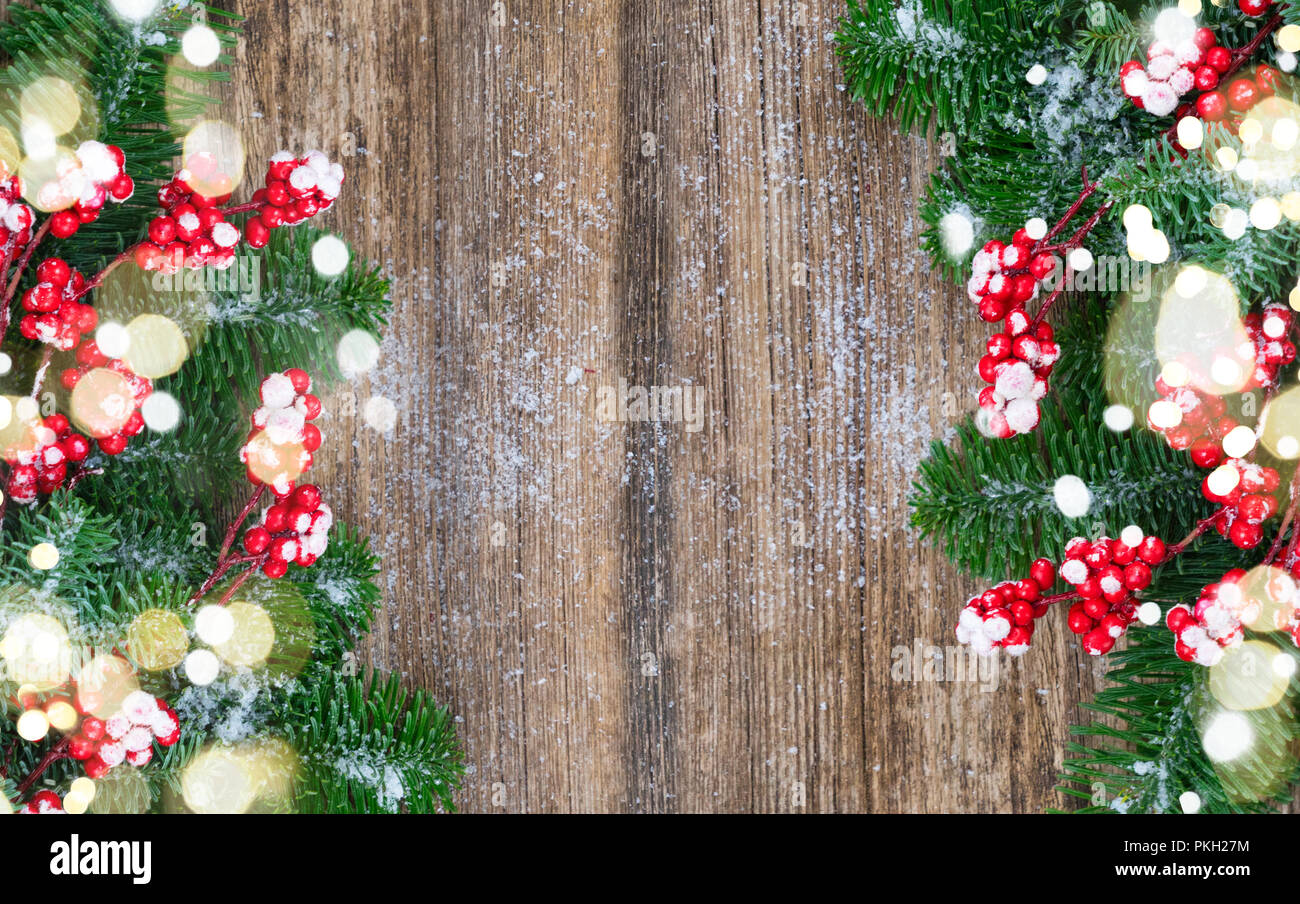red and white christmas - twig with red berries and green evergreen ...