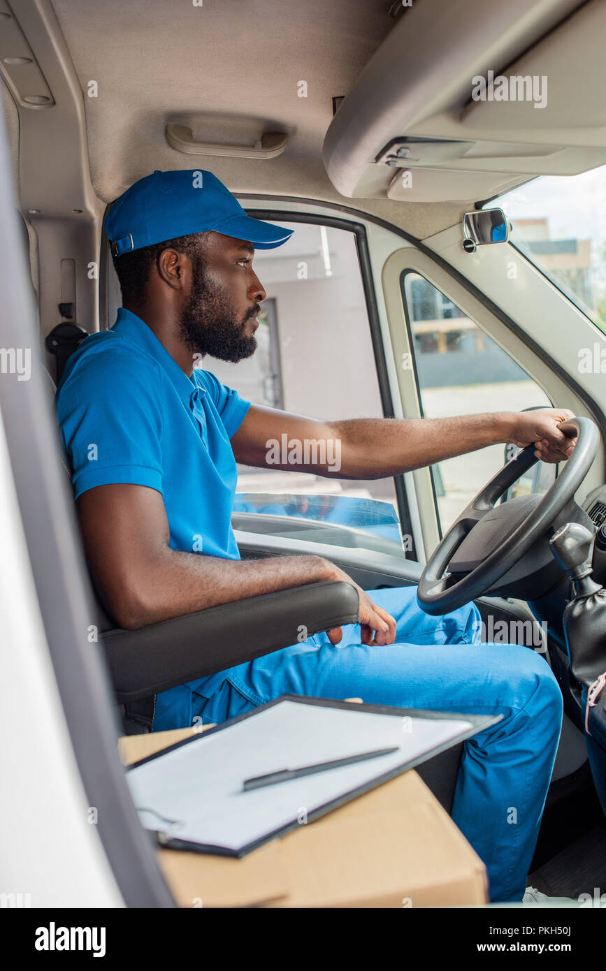 African American Delivery Man Driving Van Stock Photo Alamy