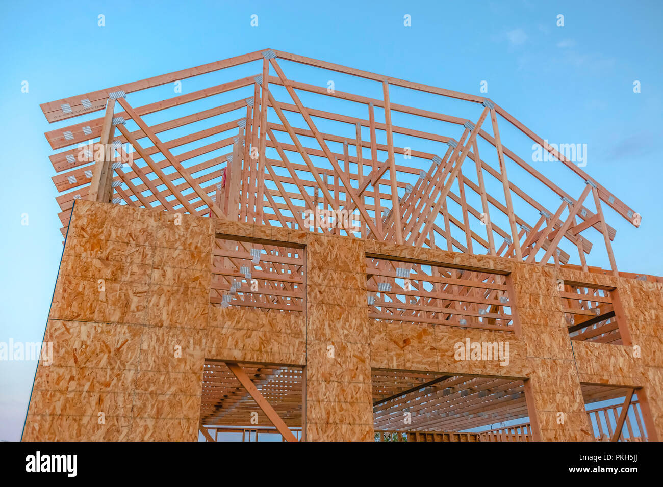 Looking upward at new building under construction Stock Photo