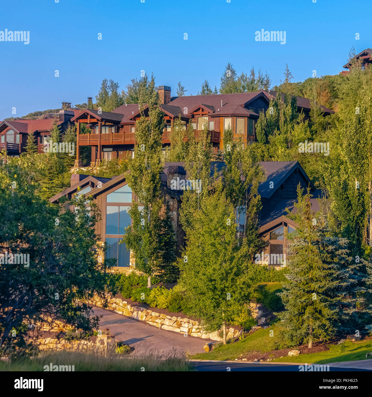Luxury homes with sunset lighting Park City square Stock Photo - Alamy