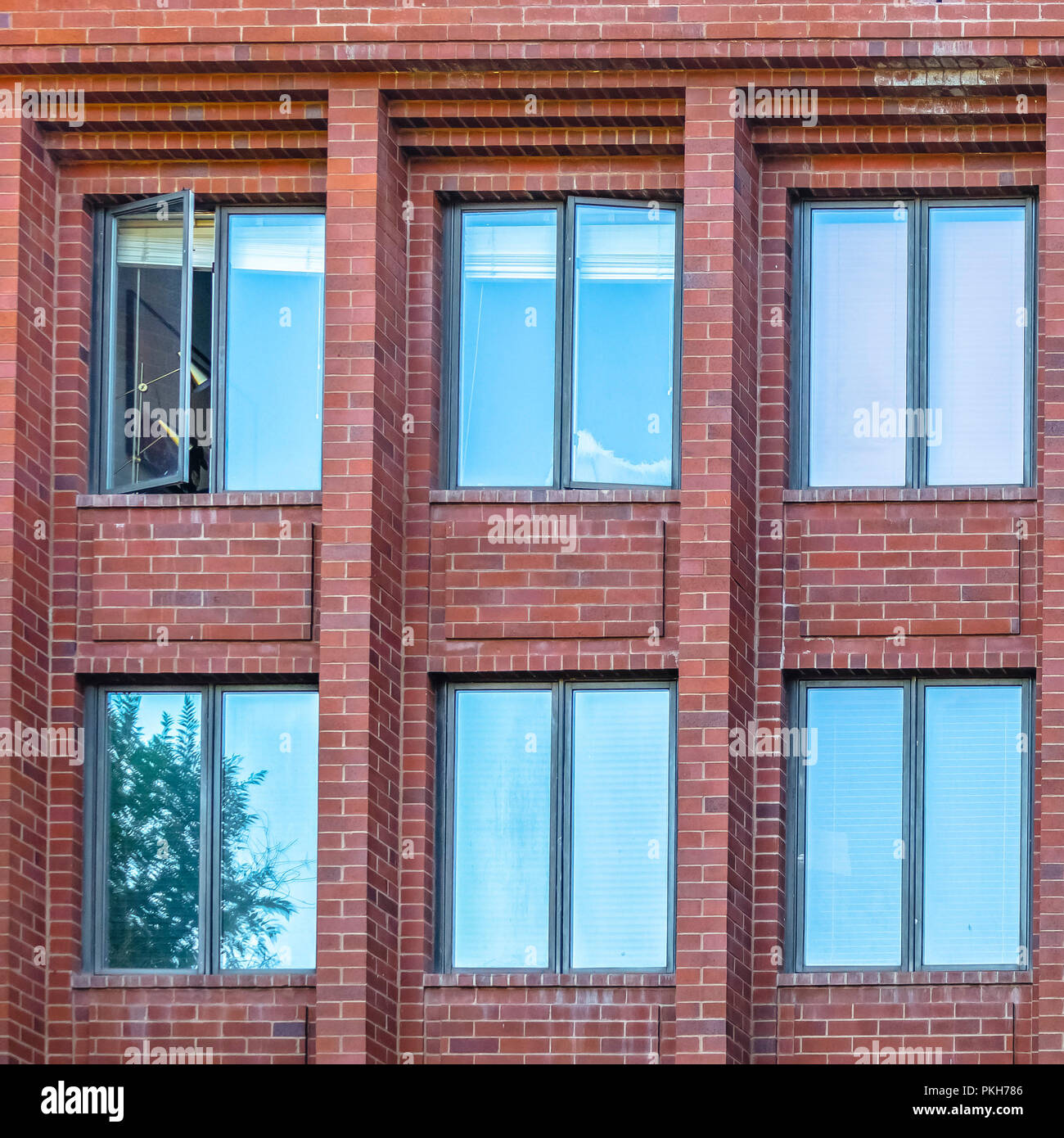 Park City apartments with teal reflective windows Stock Photo Alamy