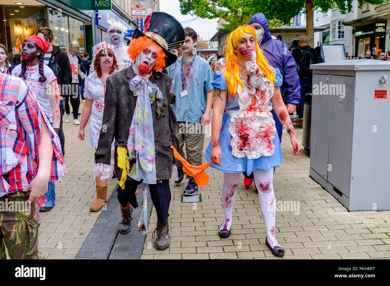 Bristol, UK. 28th Oct, 2017. People dressed as zombies are pictured as they take part in a zombie walk through the city centre. Stock Photo