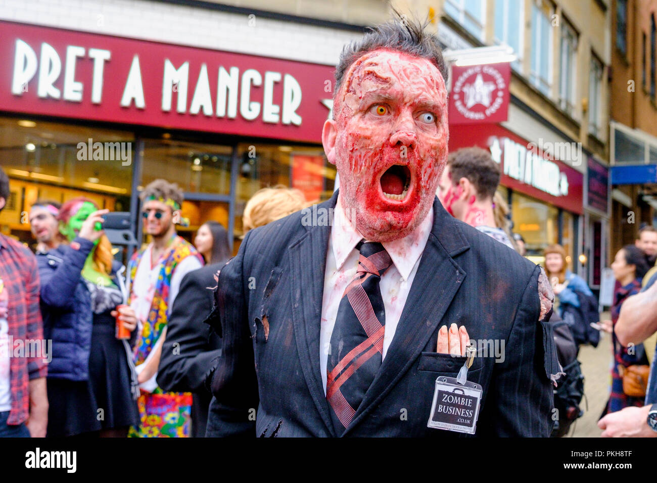 Bristol, UK. 28th Oct, 2017. A man dressed as zombie is pictured as he takes part in a zombie walk through the city centre. Stock Photo