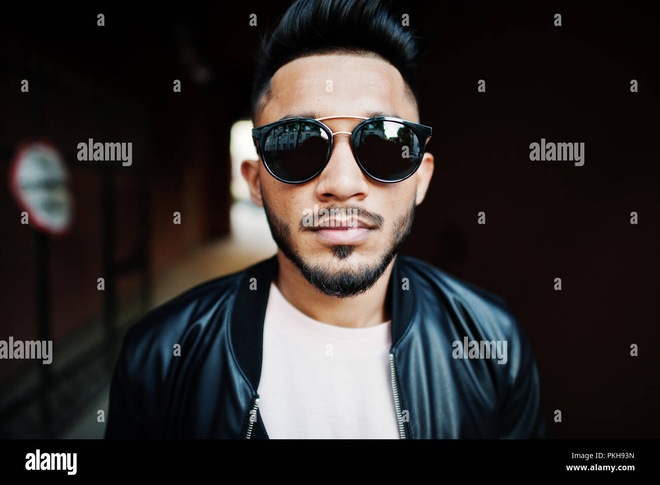 Stylish Indian Beard Man At Black Leather Jacket And Sunglasses At