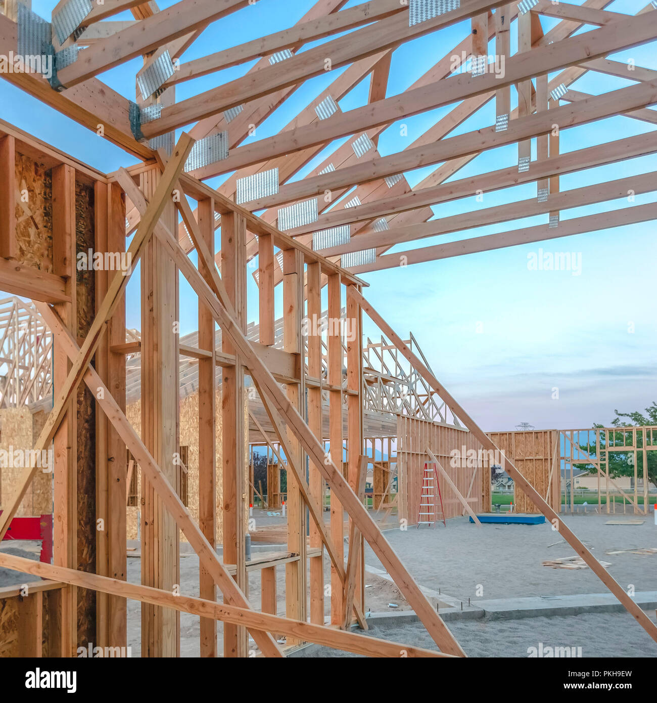 Two by fours in new construction yard square Stock Photo Alamy