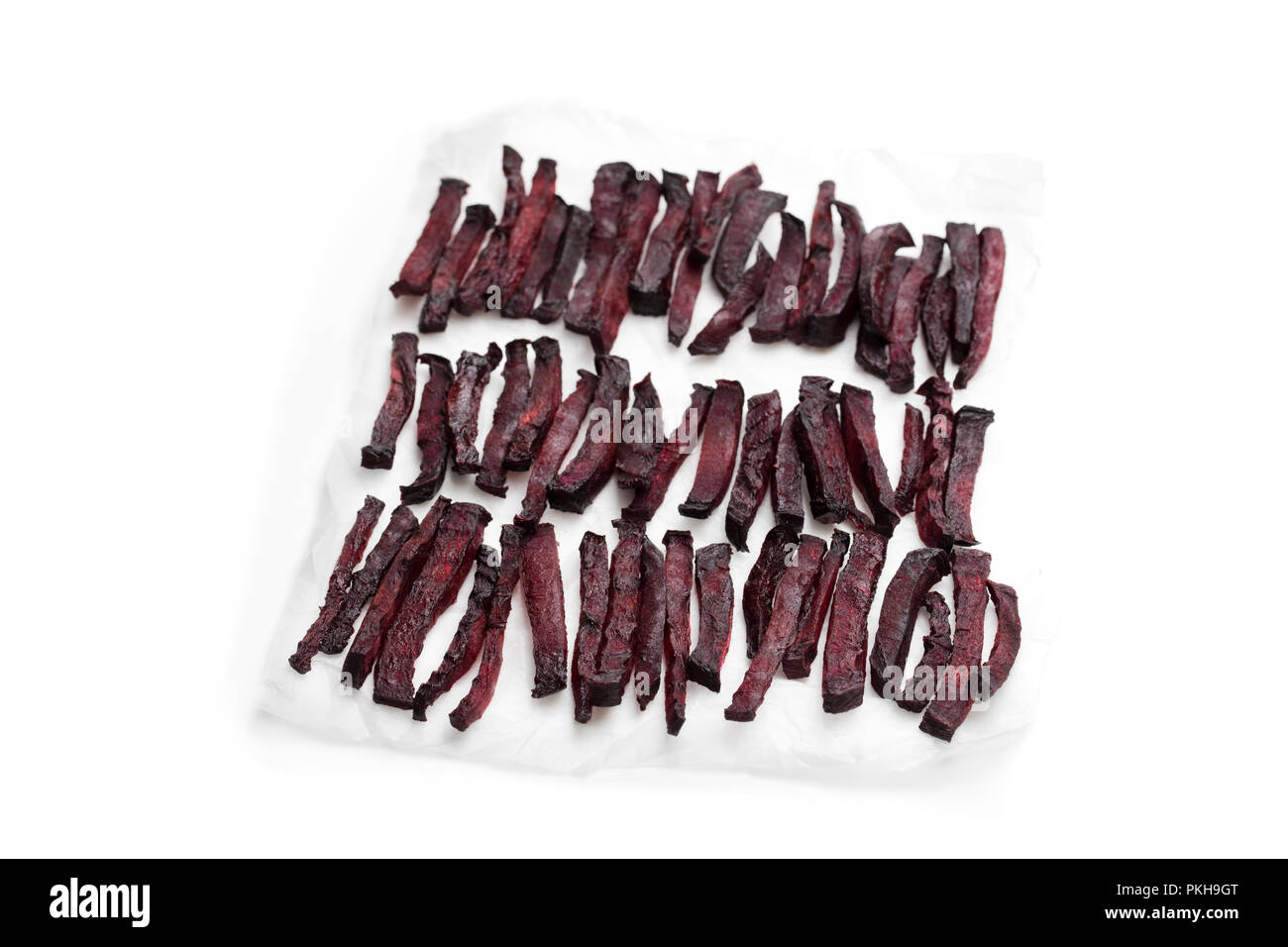 Homemade oven baked beetroot chips isolated on white Stock Photo Alamy