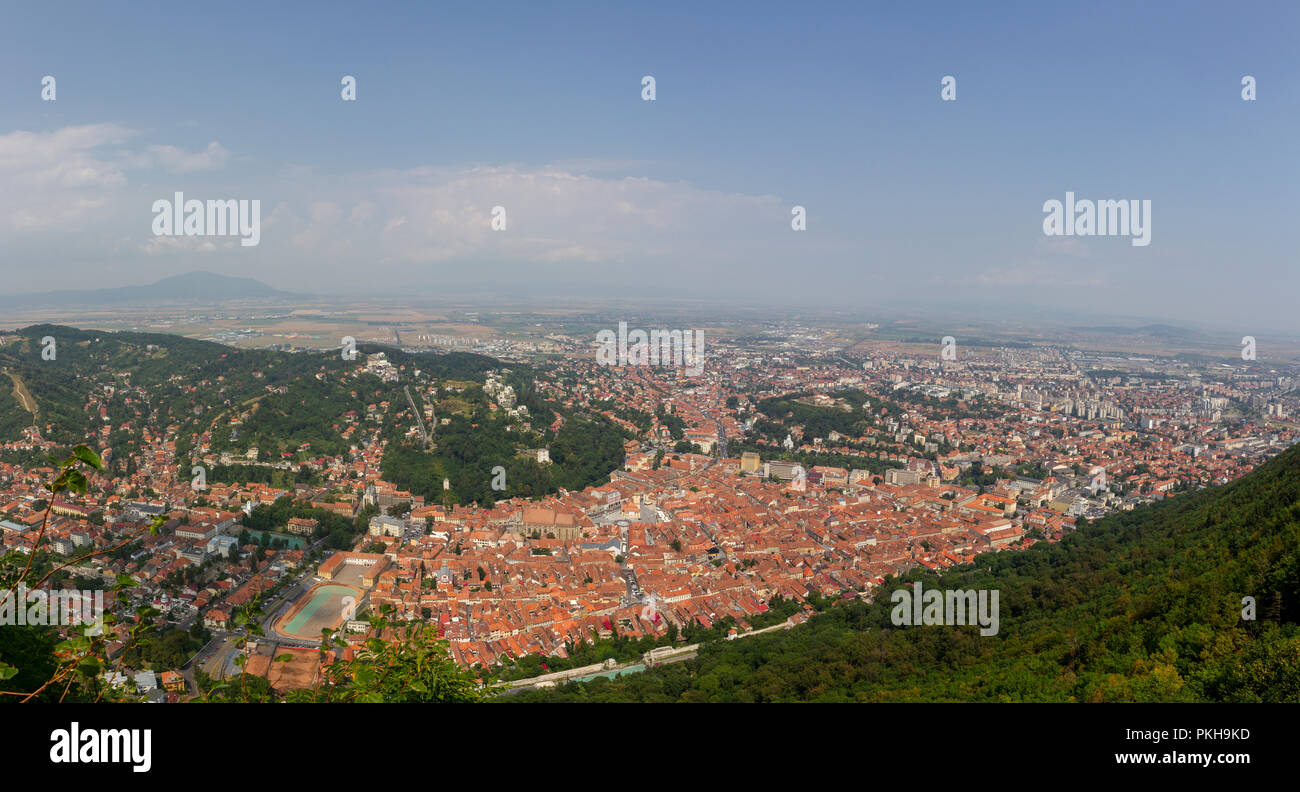 Panoramic view of Brasov from Tâmpa, Brasov, Romania. (Image stitched together from several images in post production) Stock Photo