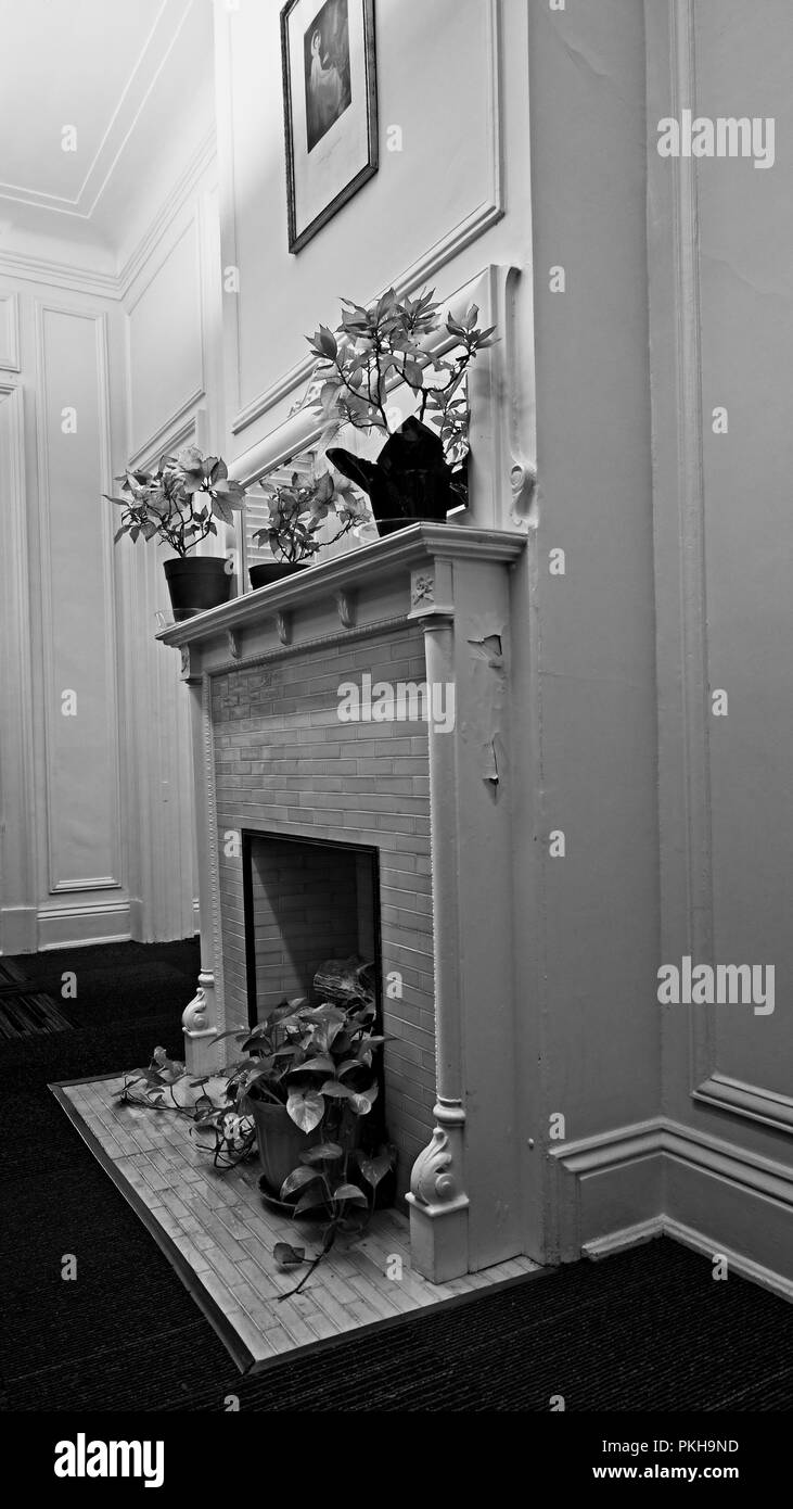 New Orleans, LA USA - May 9, 2018  - Fireplace in Old Building B&W Stock Photo