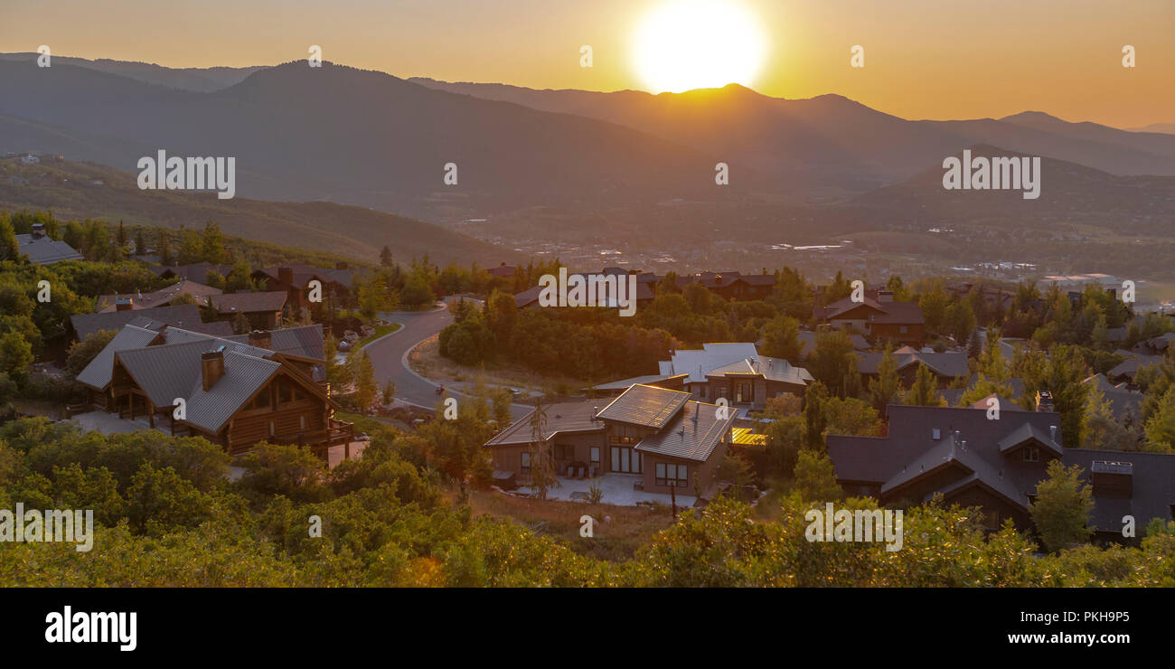 Valley views of homes in mountain hillside pano Stock Photo - Alamy