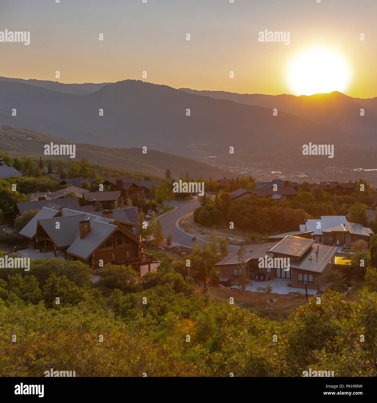 Valley views of homes in mountain hillside square Stock Photo - Alamy