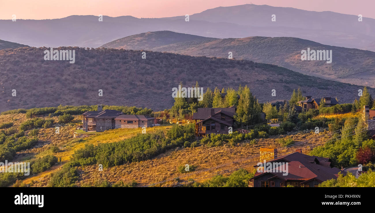Valley views of homes on the hill pano Stock Photo - Alamy