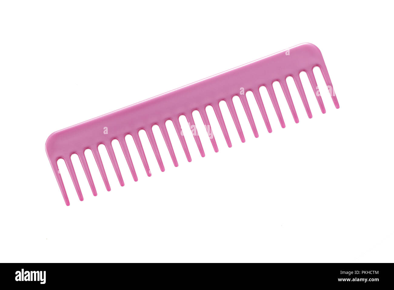 Pink hair comb isolated on a white background Stock Photo Alamy