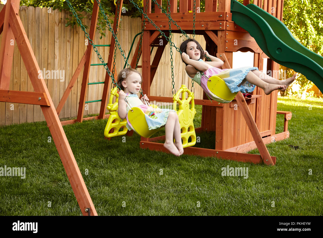 little girl playing and making funny faces Stock Photo
